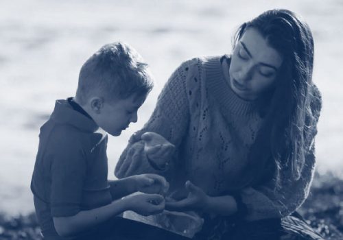 A mom and a son learn together.