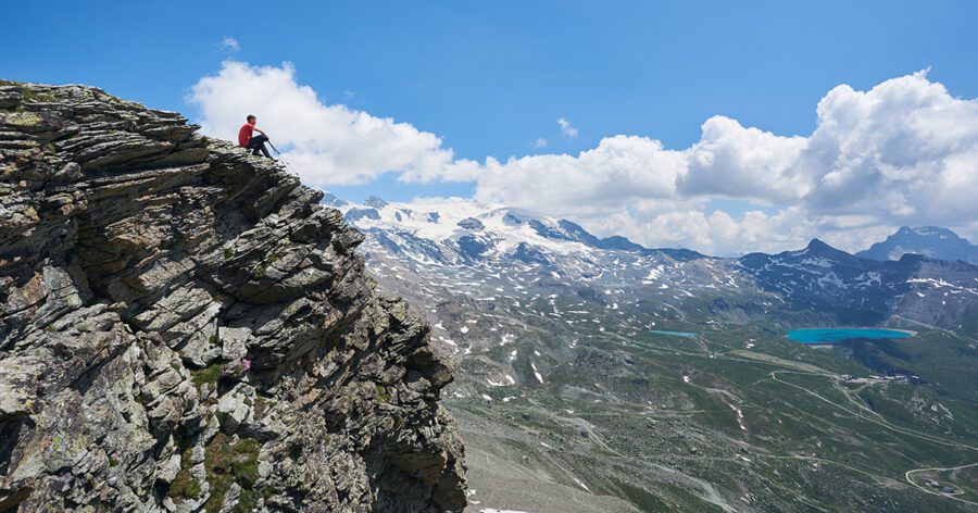 A young man overcomes a challenge.
