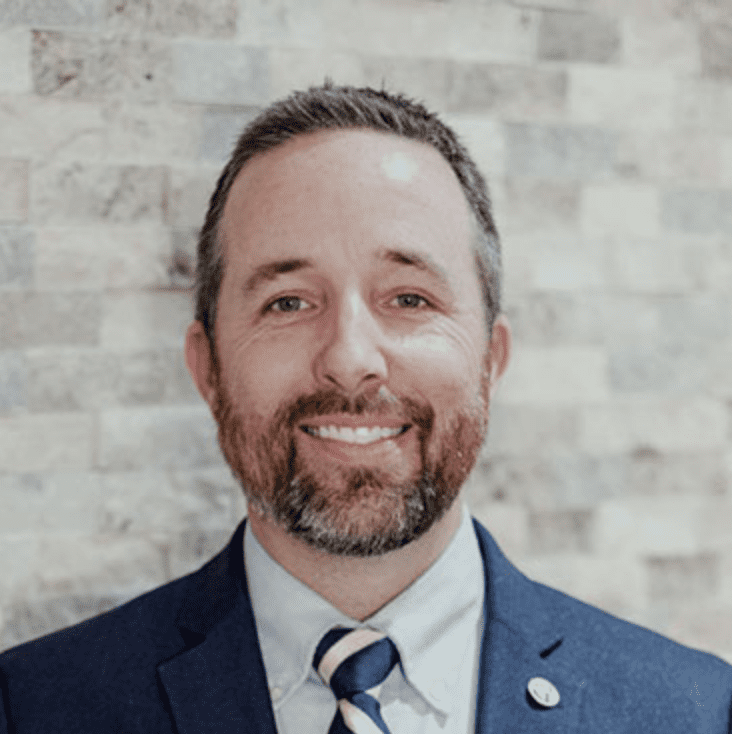 Dr. Josh Buice smiling at the camera