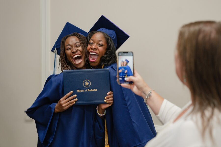 Classical Conversations graduates posing for a photo at National Commencement