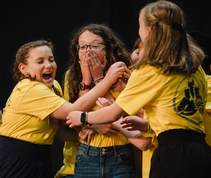 2025 National Memory finalists celebrating the winner on stage