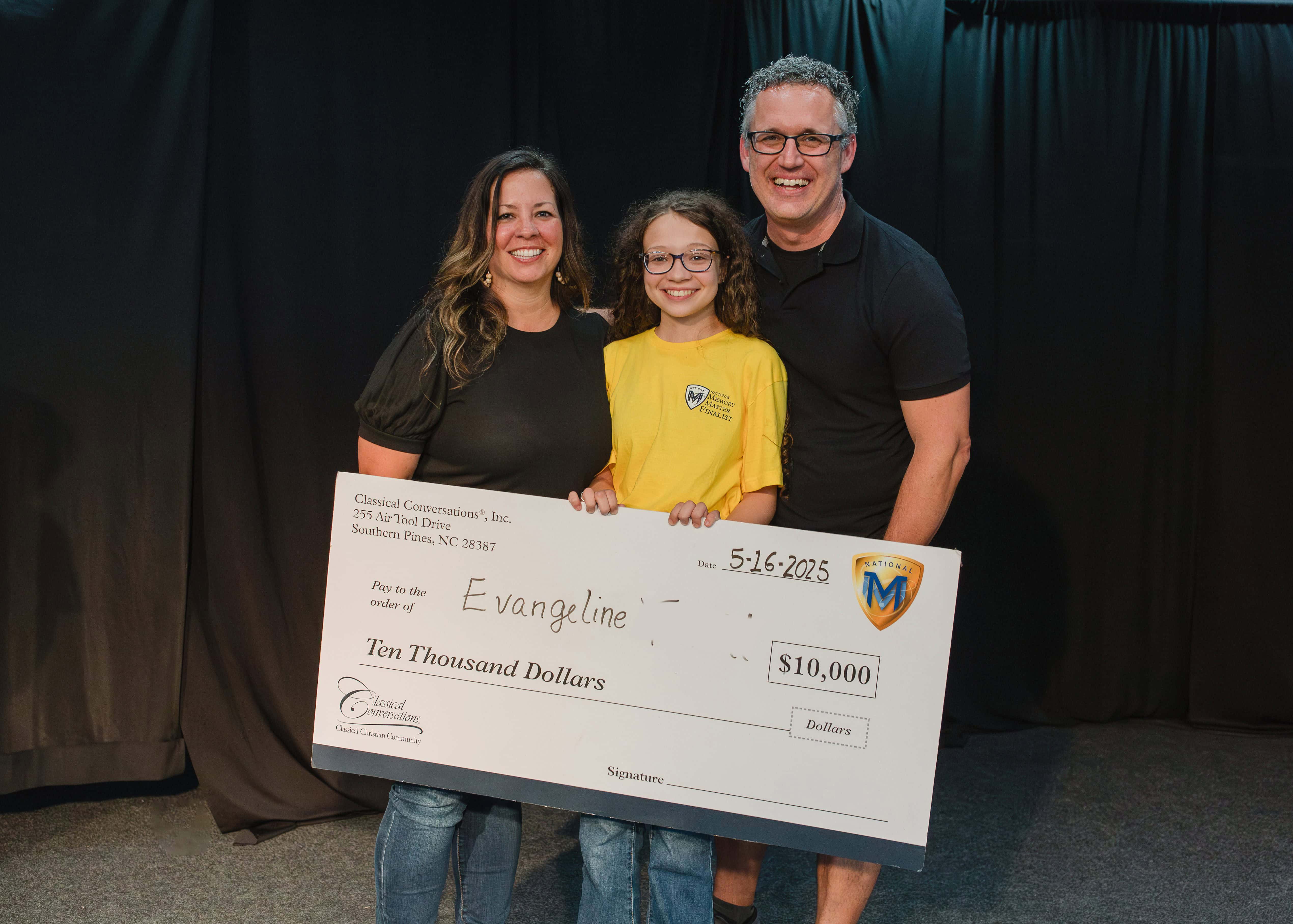 the 2025 National Memory Master winner with her parents, holding a large check